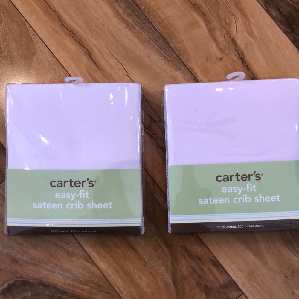 Two Carter’s Easy-fit Pink Sateen Crib Sheets